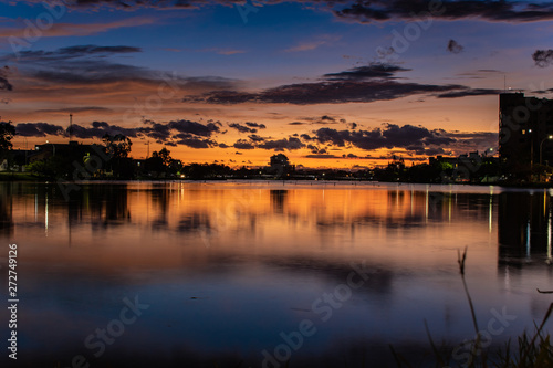 LAKE MIRRORING SUNSET