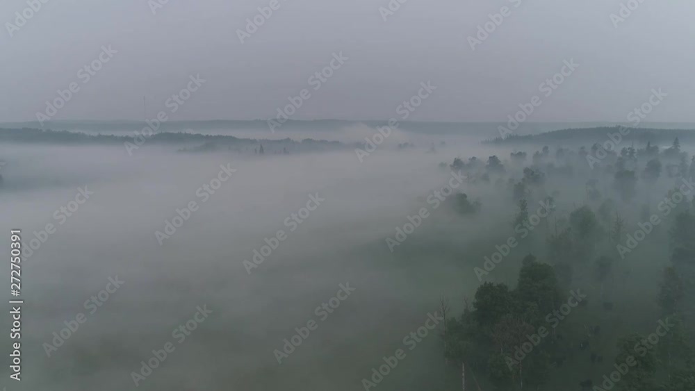 Aerial obscured ground view by fog and smoke over a rural Alberta farm. Aerial obscured ground view by fog and smoke over a rural Alberta farm.