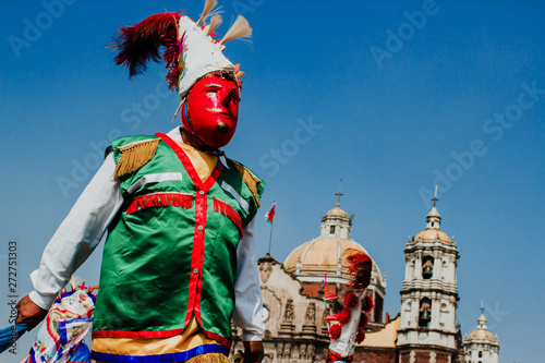 Carnival in Mexico, mexican dancers wearing a traditional mexican folk rich in color
