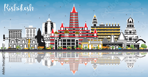 Rishikesh India City Skyline with Color Buildings, Blue Sky and Reflections.