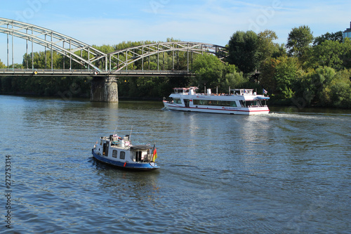 FRANKFURT, GERMANY - SEPTEMBER, 2018: tourist boats float on the river Main in summer, view from the embankment