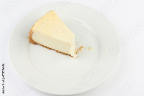 Piece of cheesecake with bite