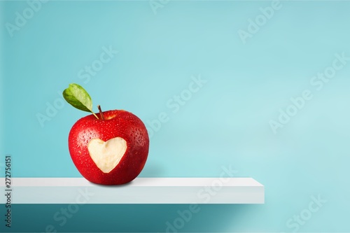 Red apple with a heart shaped photo