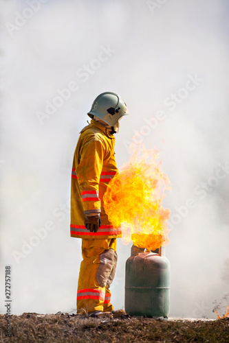 Firefighter with fire and suit for protect fire fighter for training firefighters.