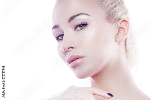 Close-up beauty face of pretty young modern woman. Perfect skin, lips, nude makeup. Isolated. White background. Copy space. Skincare facial treatment concept