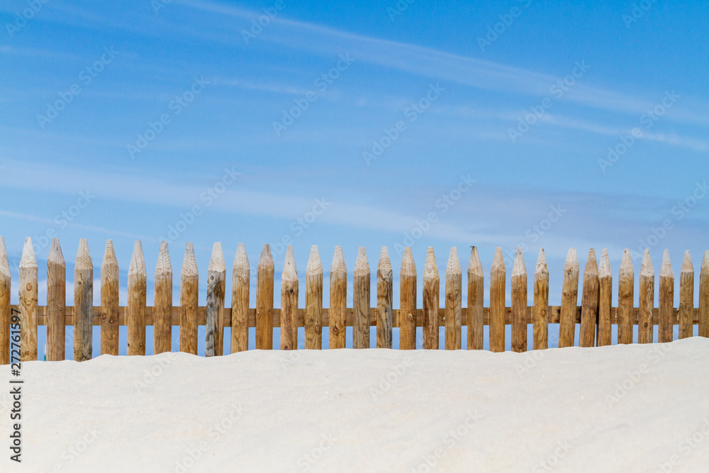 beautiful wooden fence in a sand dune