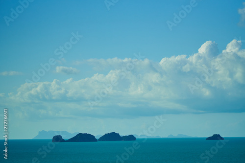 Ocean coast with waves and rocks in Thailand photo