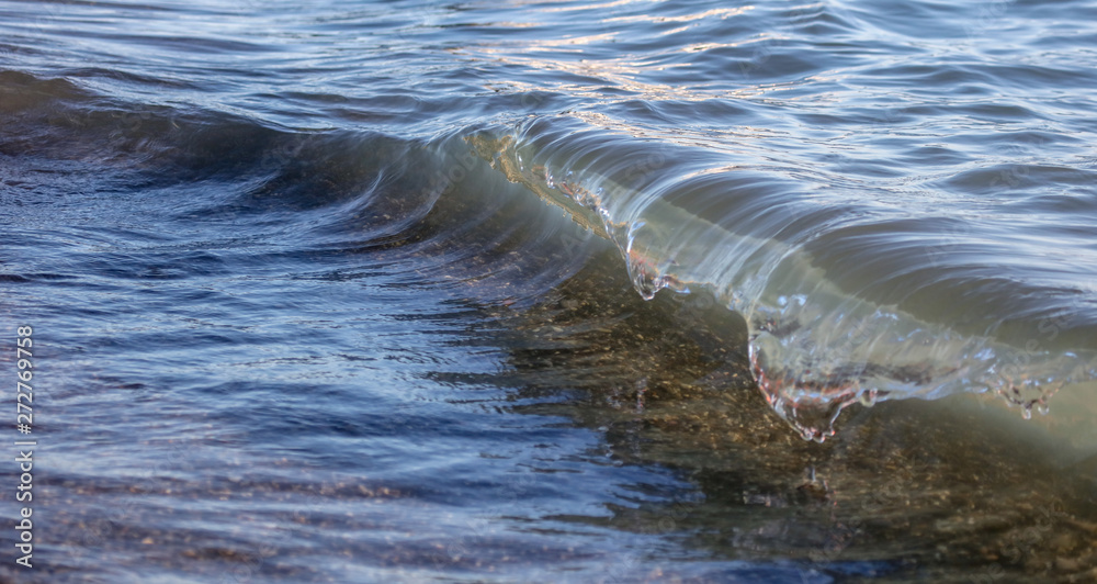 Waves on the seashore as an abstract background Waves on the seashore as an abstract background