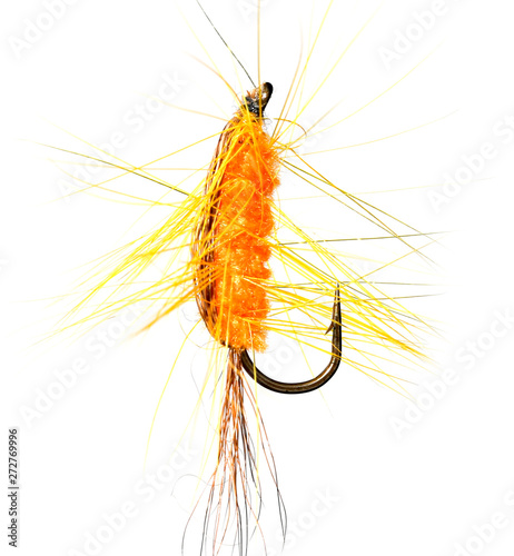 Feathers on a hook for fishing on a white background