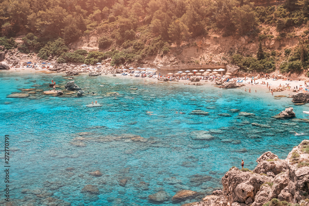 Obraz premium Popular tourist attraction on Rhodes island - azure lagoon known as Anthony Quinn Bay. Sea travel and summer paradise concept