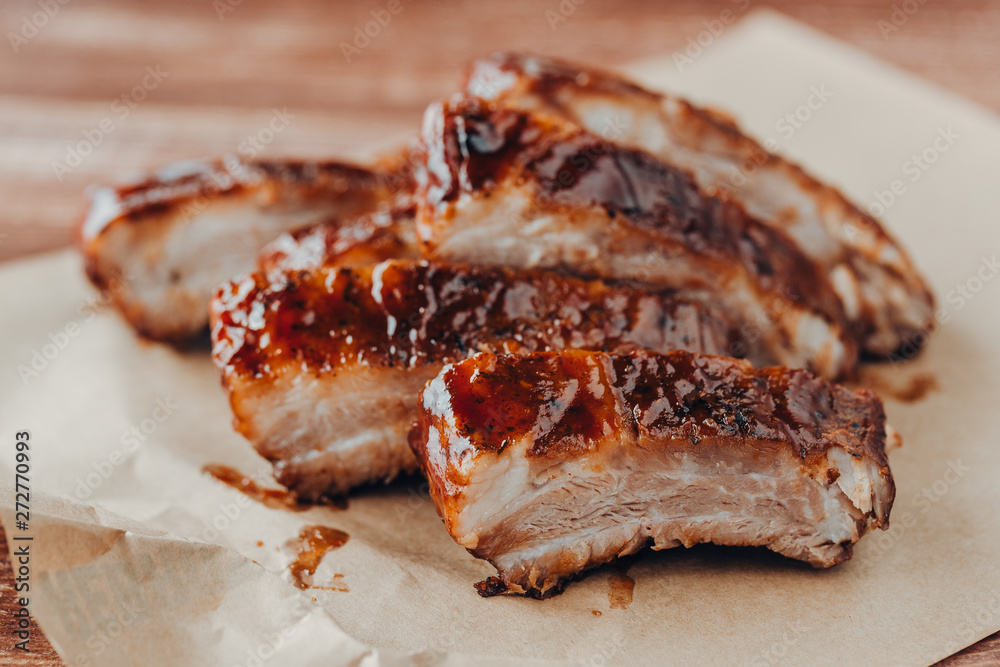 Delicious barbecued ribs seasoned with a spicy basting sauce Delicious barbecued ribs seasoned with a spicy basting sauce
