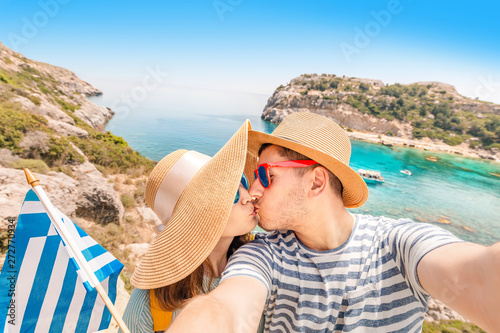 Couple European man and an Asian woman came on a vacation honeymoon to the Greek island resort