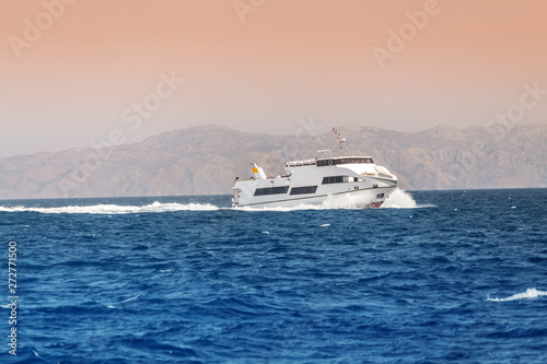 luxury motor boat or speed yacht in open sea © EdNurg