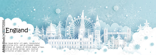 Panorama postcard and travel poster of world famous landmarks of London, England in winter season with falling snow in paper cut style vector illustration