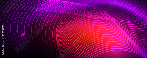 Shiny neon lights  dark abstract background with blurred magic neon light curved lines