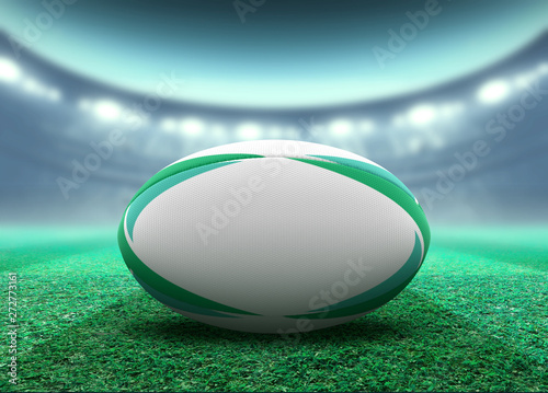 Floodlit Stadium And Rugby Ball
