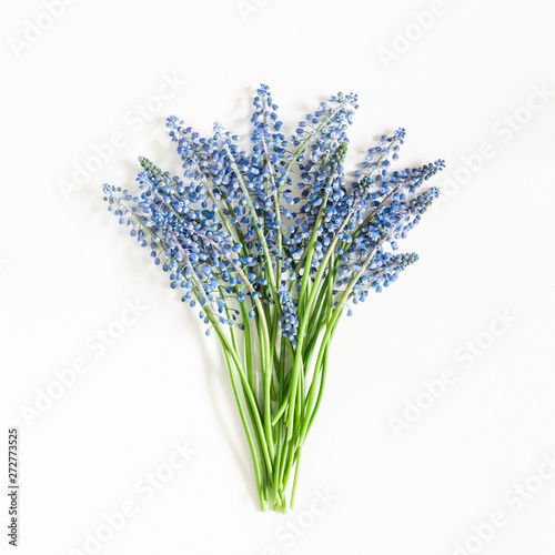 Flowers composition. Blue flowers on white background. Flat lay  top view