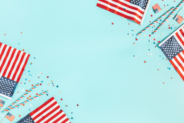 4th of July American Independence Day decorations on blue background. Flat lay, top view, copy space