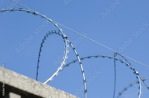 American barbed wire, called razor wire, for border.