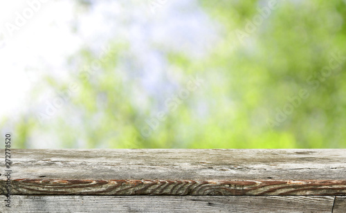 Empty wooden table background for display montages