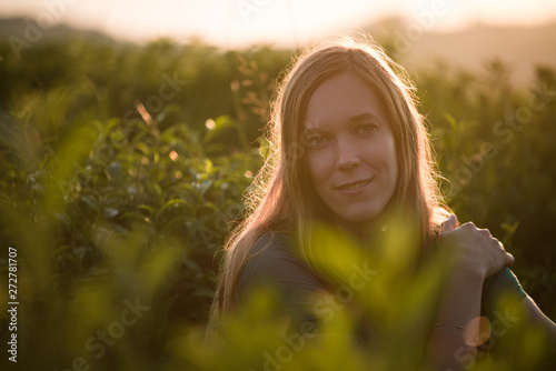 young woman at sunset.