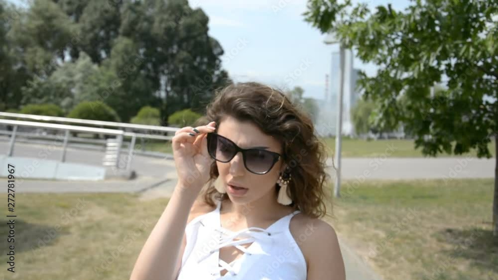 Back view woman head with curly hair Back view woman head with curly hair