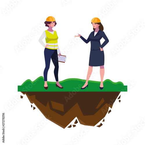 engineer with female builder on the lawn