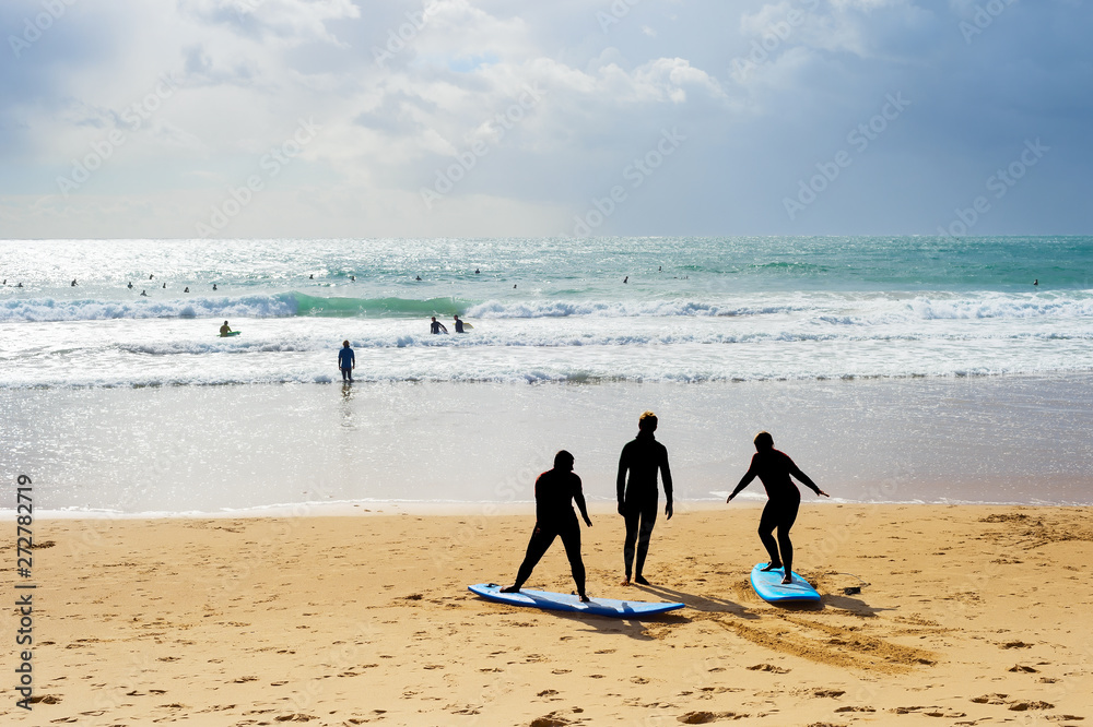 Surfing school lessons beach Portugal
