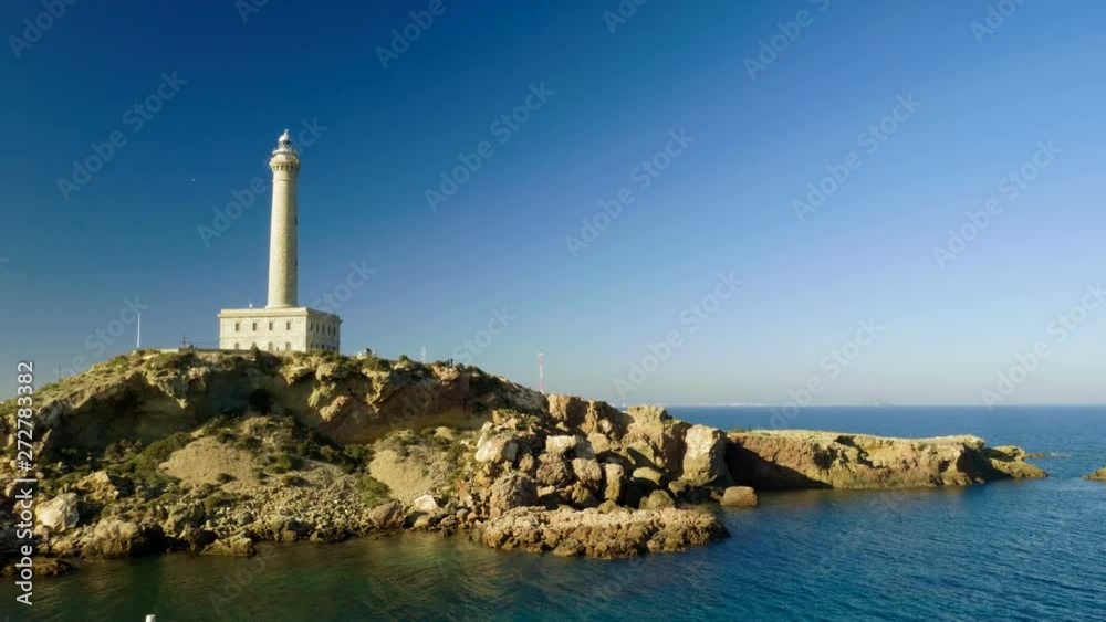 The lighthouse at Cabo de Palos. Landscape of Mediterranean coast in Spain. 4K The lighthouse at Cabo de Palos. Landscape of Mediterranean coast in Spain. 4K