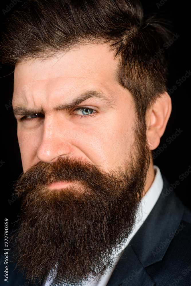 Fototapeta premium Handsome man with beard. Male fashion concept. Bearded man portrait. Handsome stylish bearded man. Sexy male, macho, long beard. Serious bearded business man. Stylish handsome businessman. Close-up.
