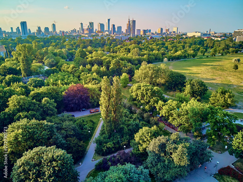 A beautiful panoramic view of the sunset in a fabulous evening in June from drone at Pola Mokotowskie in Warsaw, Poland - "Mokotow Field" is a large park in Warsaw - Is called "Jozef Pilsudski Park"