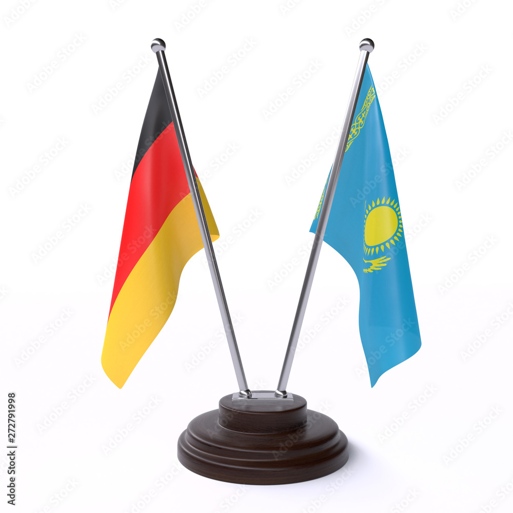 Germany and Kazakhstan, two table flags isolated on white background. 3d image Germany and Kazakhstan, two table flags isolated on white background. 3d image