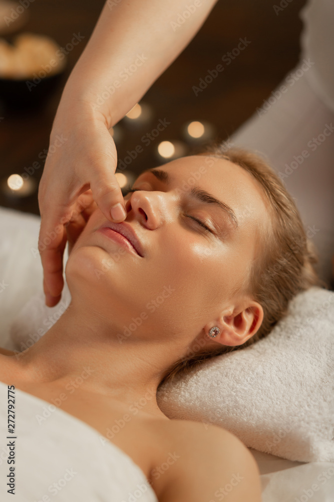 Beautiful lady with flawless skin proposing her face to professional master Beautiful lady with flawless skin proposing her face to professional master