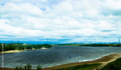 Wallpaper Mural Cloudy blue sky on the horizon of Russian fields and mountains. Summer forest on a sunny day. Torontodigital.ca