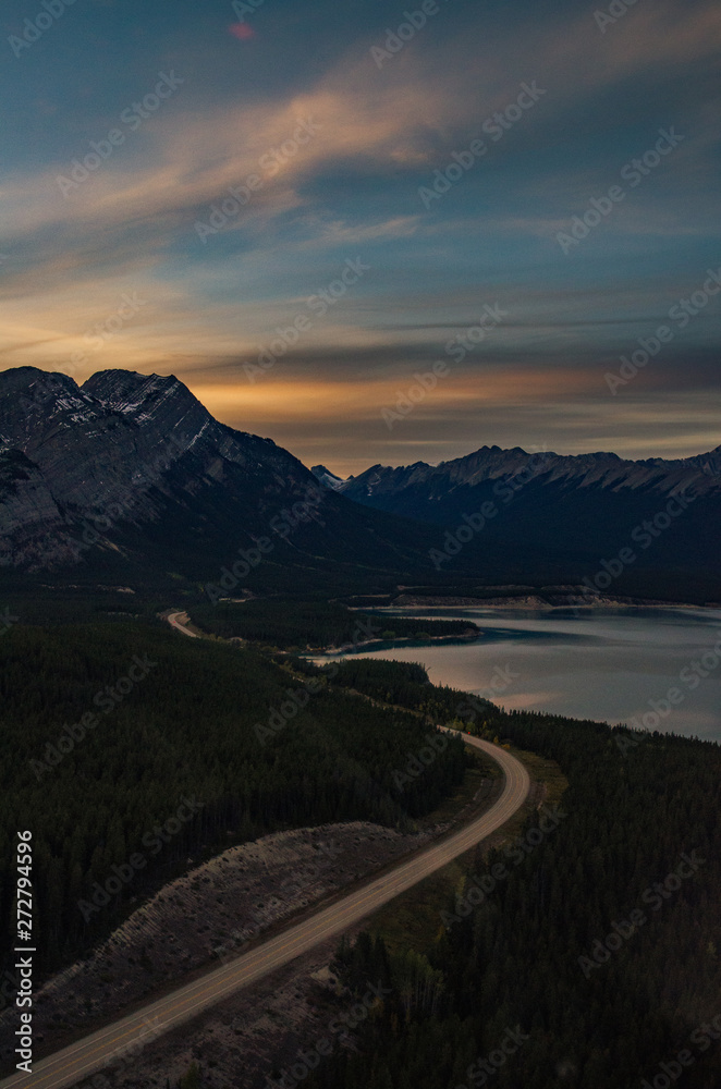 Epic Helicopter Flight during sunset at the Abraham Lake in Canada