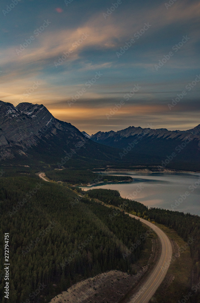 Epic Helicopter Flight during sunset at the Abraham Lake in Canada