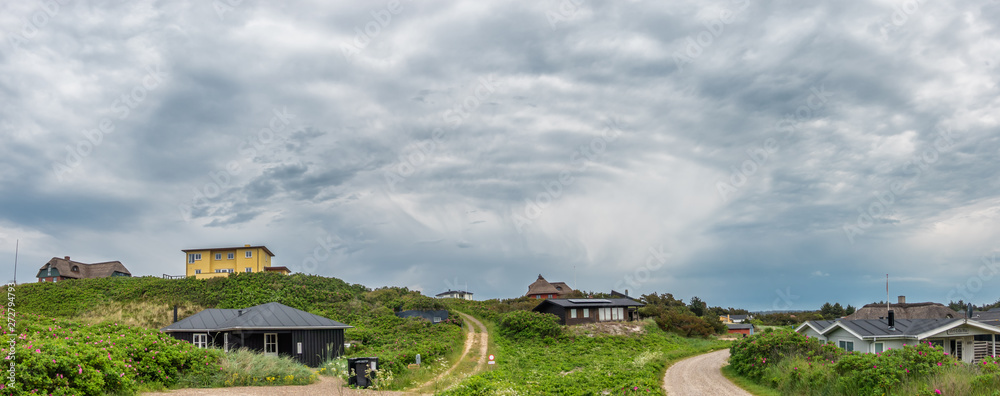 Obraz premium Vacation homes houses in Henne at the North Sea coast in Denmark