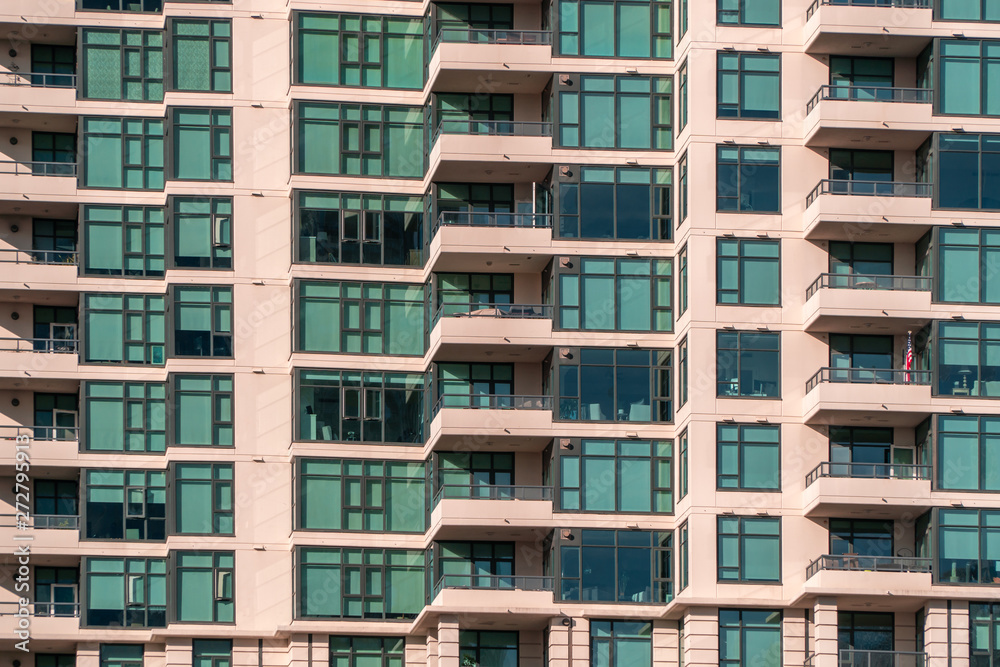 San Diego, USA, 2018. Real estate, accommodation, rent, lease concept. Closeup view on balconies and windows of apartment home
