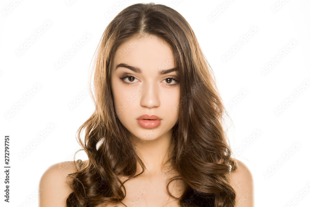 Young woman with makeup, posing on white background Young woman with makeup, posing on white background