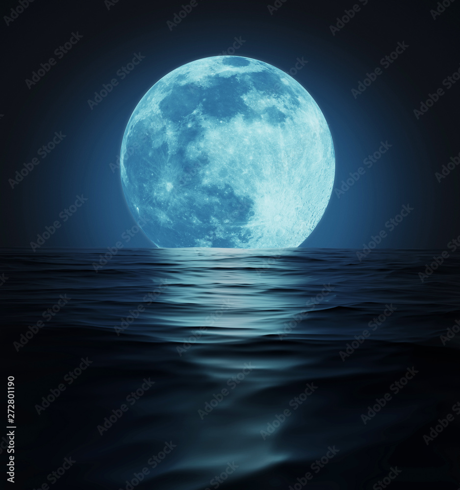 Big Blue Moon Reflected in Dark Wavy Water Surface Big Blue Moon Reflected in Dark Wavy Water Surface