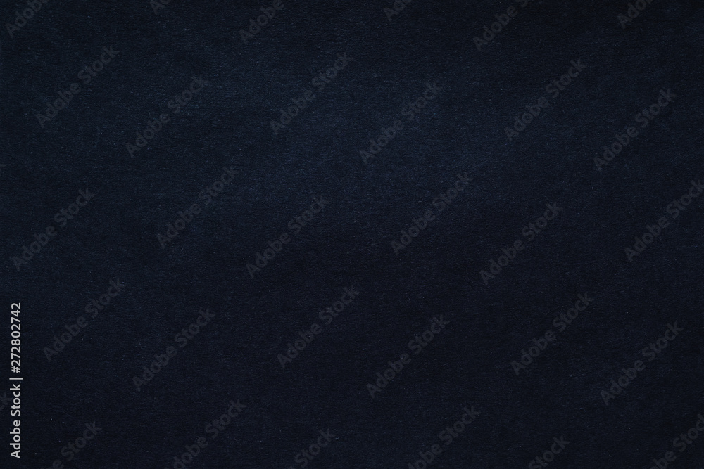 Black felt texture abstract art background. Colored fabric fibers surface. Empty space. Black felt texture abstract art background. Colored fabric fibers surface. Empty space.