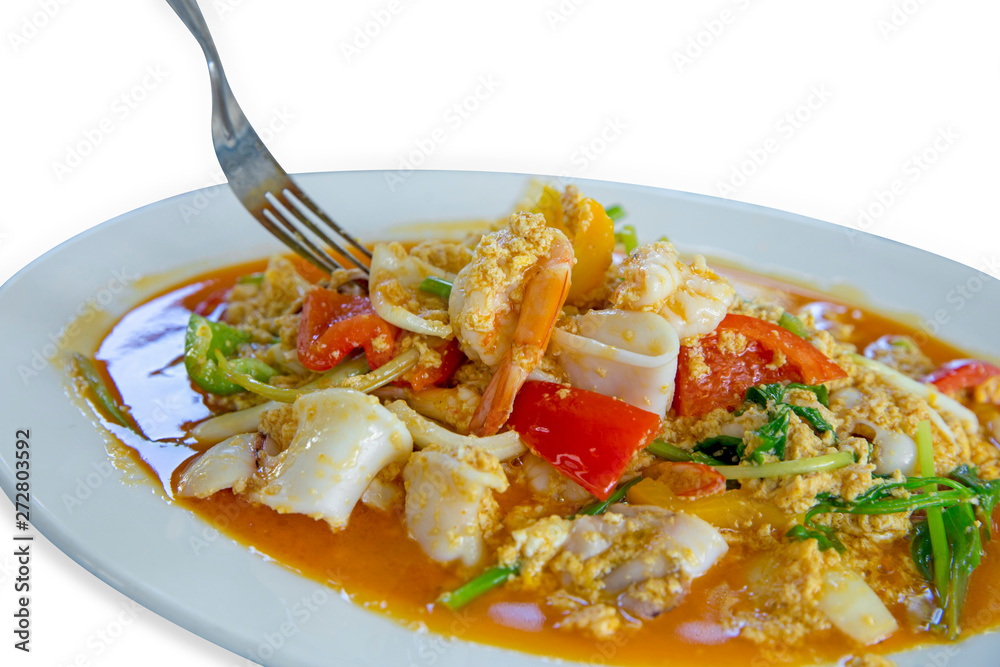 Thai food, Shrimp and squid with curry powder, focus selective. Thai food, Shrimp and squid with curry powder, focus selective.