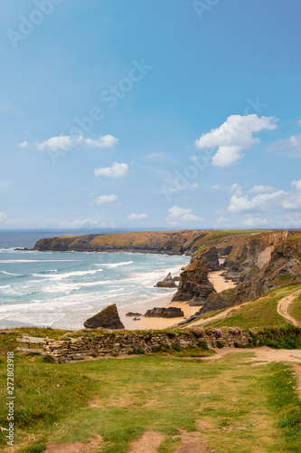 steep coast in cornwall with blue sky 