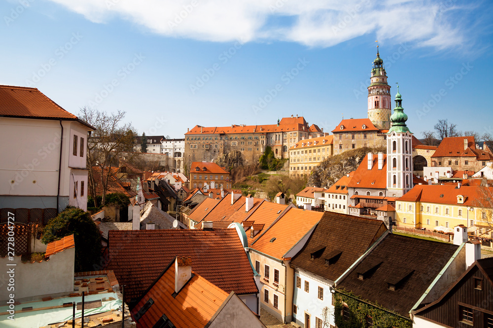 Panorama of the old Town of Cesky Krumlov in South Bohemia, Czech Republic with blue sky. UNESCO World heritage Site and famous place for tourism. Beautiful summer sunny day.