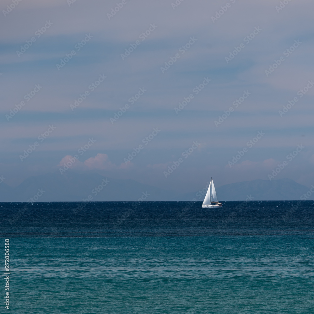 White sailboat on the sea