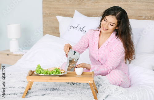 Beautiful young woman havin...