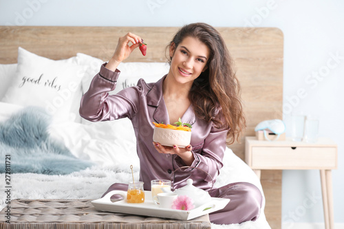 Beautiful young woman havin...
