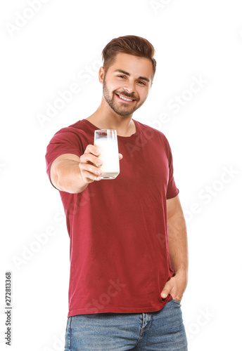 Handsome man with glass of ...