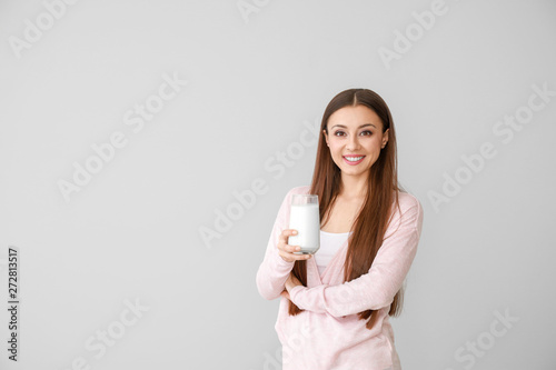 Beautiful woman with glass ...