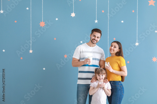 Young family with glasses o...